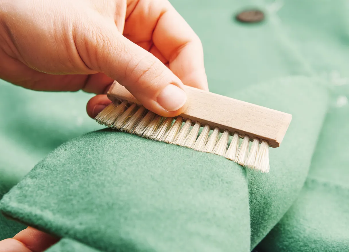 Image of laundry being brushed